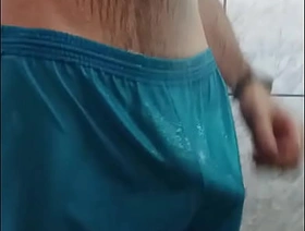 Man takes a shower and shows off his bulge volume at hand his shorts gay hot porn